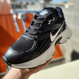 کفش اسپرت زنانه نایکی (Nike) مدل لژدار | رنگ مشکی‌سفید (کلاسیک)